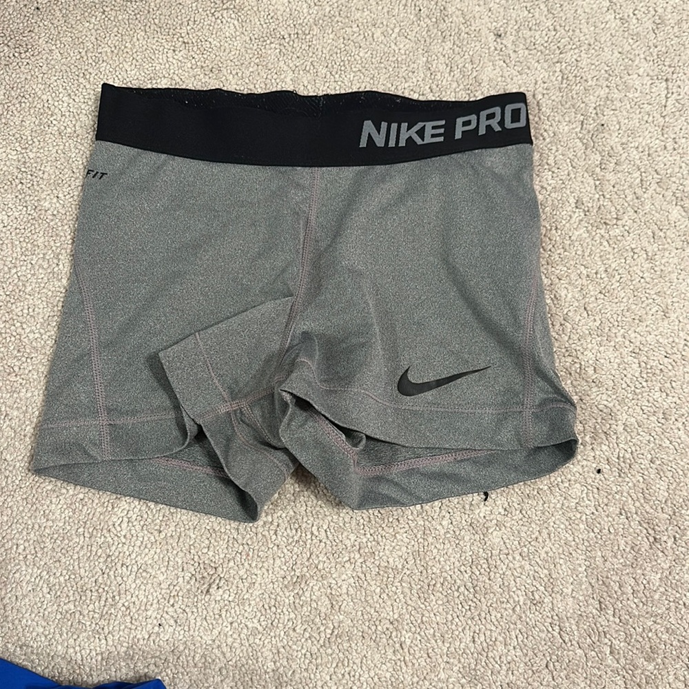 Nike dry-fit nike pros. worn once. in new condition.